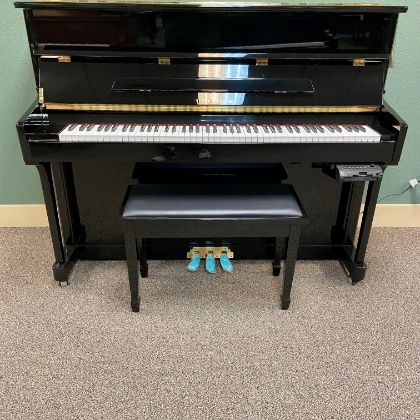 /pianos/used-inventory/Story---Clark-Upright
